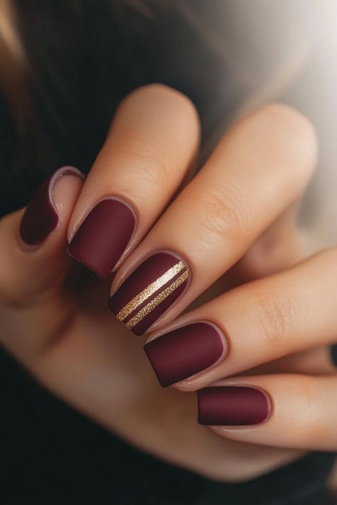 Fall in love with your nails all over again with these 58 gorgeous designs. From matte finishes to metallic accents, find your perfect fall look. Tap the link for more fall nail inspiration! Winter Fall Nail Designs, Burgundy Accent Nails, November Nails Maroon, Gloss And Matte Nails, Matte Burgundy Nails Short, November Nails Fall Matte, Maroon Nails Design Short, Silver Fall Nails, Fall Accent Nail Ideas