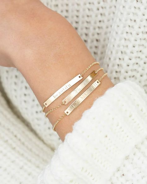 These dainty bar bracelets have to be my favorite accessory! They can have names, dates, words, roman numerals - any writing you wish! PREORDER NOW 🔗 https://kaitlynroseco.com/products/preorder-laser-engraved-personalized-bar-bracelet . . #laserengraved #laserengraving #laserdesign #barbracelet #engravedbracelet #personalizedjewelry #gifts #specialgifts #shopsmall #shoplocal #shophandmade #mamaownedbusiness Engraved Bar Bracelet, Bar Bracelet Personalized, Silver Bar Bracelet, Gold Bar Bracelet, Bracelet Name, Customised Bracelets, Gold Lariat Necklace, Gold Moon Necklace, Evil Eye Necklace Gold