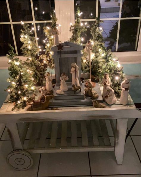 Nativity Village Display, Christmas Manger Decor, Indoor Manger Scene, Willow Nativity Display Ideas, Nativity Scene Table Decor Ideas, Ways To Display Nativity Scene, Small Nativity Set Display Ideas, Nativity Under Christmas Tree, Nativity Scene Set Up Ideas