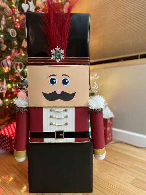 Gift Tower Ideas Christmas, Christmas Gift Wrapping Tower Ideas, Gift Towers Christmas, Nutcracker Gift Wrapping Ideas, Nutcracker Wrapping Ideas, Nutcracker Present Tower, Christmas Gift Wrapping Ideas For Kids, Nutcracker Gift Box Diy, Cardboard Box Nutcracker Diy