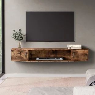 Millwood Pines Coombes Floating TV stand for TVs up to 75" | Wayfair Floating Wall Mount Tv Stand, Wall Mount Tv Shelf, Wall Mounted Media Console, Floating Entertainment Center, Under Tv, Console Shelf, Tv Wand, Floating Tv Stand, Floating Tv