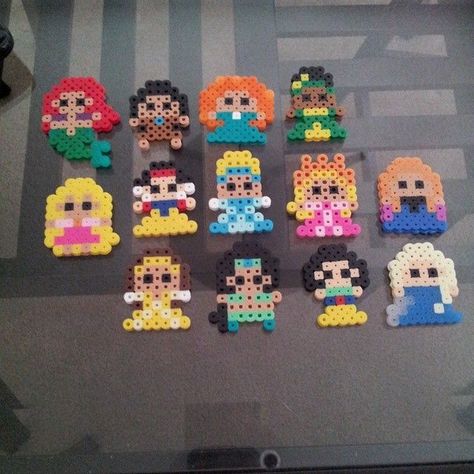 Disney Princess perler beads by tiffykinz411- Original Madam FANDOM 8bit designs: https://www.etsy.com/listing/190198731/princess-party-favors-8bit-style: Perler Beads Ideas Disney, Princess Perler Beads, Melt Beads, Perler Beads Ideas, Babysitting Crafts, Easy Perler Bead Patterns, Beading For Kids, Easy Perler Beads Ideas, Hamma Beads