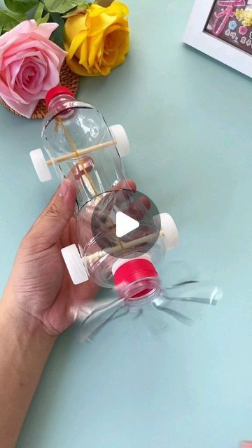 Creative Ideas on Instagram: "Transform an ordinary water bottle into a fun and functional toy car! Follow along as we guide you through the steps to create your own water bottle car. From assembling the wheels to adding finishing touches, watch as this simple DIY project turns recycled materials into a creative and entertaining toy. Perfect for kids and adults alike, this activity combines creativity, sustainability, and fun!" Diy Toys Easy, Diy Recycled Toys, Ecofriendly Crafts, Craft Ideas Paper, Recycling Activities, Recycle Water Bottles, Water Bottle Crafts, Recycled Toys, Paper Craft Ideas