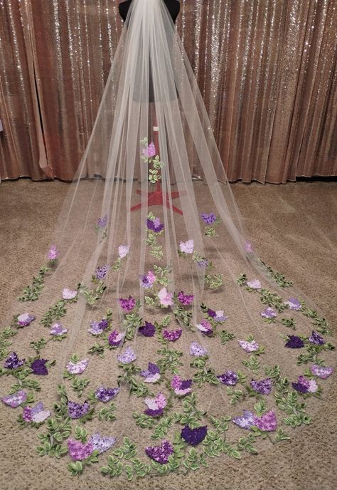 The Lilac Veil is a 10-foot cathedral, made with ivory tulle, green vines, and purple Lilacs embroidered in many shades. Lilacs are all embroidered with a custom blend of thread colors to look as real as possible. The colors are fully customizable to your wedding palette, and I love custom orders so please reach out with any questions! Wedding Ideas Light Purple, Purple Gray And White Wedding, Purple And Silver Wedding Flowers, Subtle Rapunzel Wedding, Wedding Light Purple Theme, Lavender Lilac Wedding, Pink Purple And Sage Wedding, Black Gold Lavender Wedding, Sage And Dark Purple Wedding