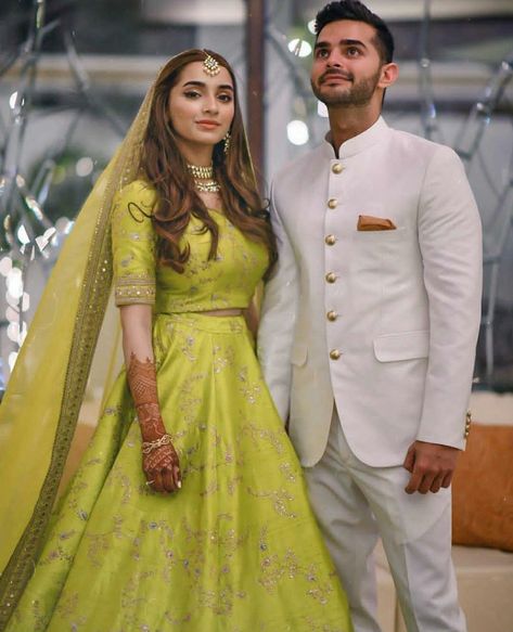 The engagement ceremony is one of the most important pre wedding function and you do want to look your best on this day! #outfits #coupleoutfits #indiancoupleoutfits #indiancoupleoutfitideas #engagement #engagementceremony #engagementceremonyindian #indianoutfits #bridaloutfits #sherwani #sangeetoutfits #traditionalindian #engagementoutfitsindiancouple Engagement Outfit Ideas Indian Women, Indian Engagement Outfit, Natasha Khan, Engagement Dress For Groom, Engagement Dress For Bride, Reception Outfits, Indian Engagement, Groom Dress Men, Mehndi Dress