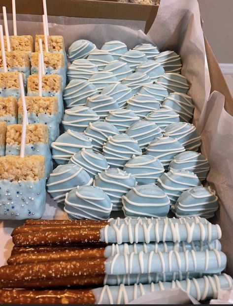 Light Blue Dessert Table Ideas, Babyshower Treat Table, Baby Shower Desert Ideas For Boy, Baby Shower Rice Krispie Treats Boy, Baby Its Cold Outside Baby Shower Ideas Blue, Light Blue Desserts, Baby Shower Boy Dessert Table, Winter Wonderland Treats Dessert Tables, Blue Christmas Baby Shower Ideas