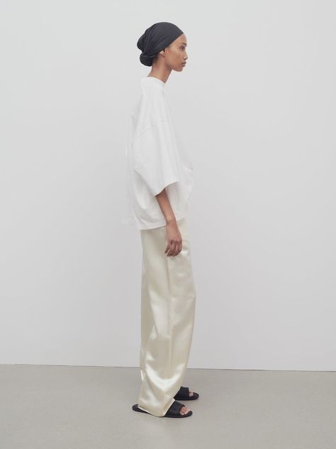 White Tonal Outfit, The Row Styling, The Row Outfits Summer, The Row Fall 2024, The Row Inspired Outfits, Silk Wide-leg Pants With Pressed Crease, Satin Tapered Leg Workwear Pants, Satin Tapered Leg Work Pants, Satin Tapered Leg Pants For Work