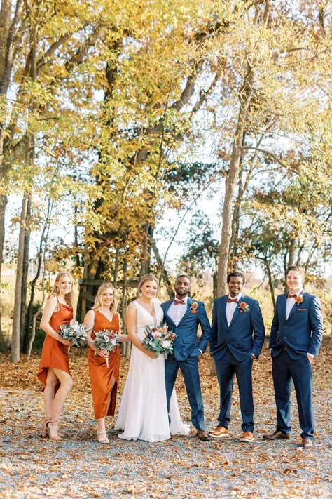 Cornflower Blue And Burnt Orange Wedding, Blue Suit And Orange Dress, Navy Blue And Rusty Orange Wedding, Navy Blue And Burnt Orange Wedding Suit, Terracotta Groomsmen Attire Jeans, Navy Blue Tux With Burnt Orange, Burnt Orange And Navy Wedding Party, Steel Blue And Orange Wedding, Blue And Orange Wedding Party