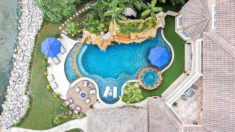 Melbourne Beach Tropical Backyard Escape  Image of Melbourne Beach pool Contractorr Insane Pools, Backyard Escape, Florida Pool, Freeform Pools, Lagoon Pool, Melbourne Beach, Tropical Backyard, Tropical Pool, Backyard Pools