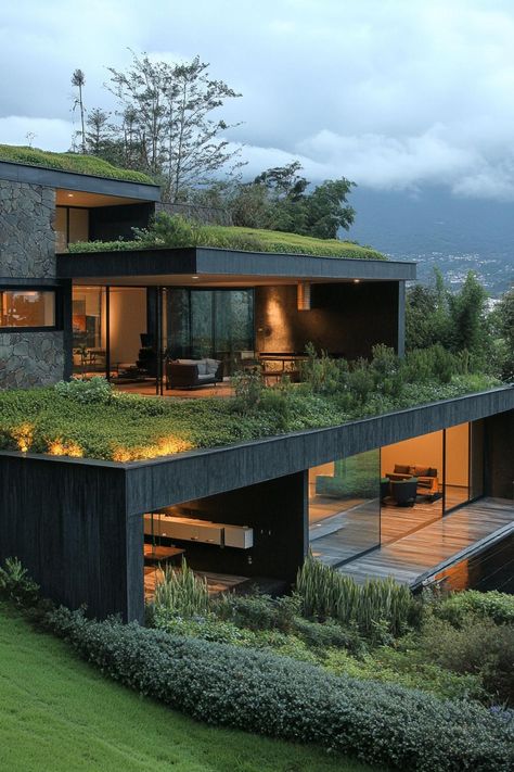 Modern green exterior house with earth roof. Check out all of these green exterior houses that offer a mix of creative and eco-friendly designs. Gazebo House Design, Eco Friendly Modern House, Stone House Designs Exterior, Green Roofs On Houses, Creative House Exterior, Hyper Modern House, Eco Friendly Architecture Design, Green Roofs Architecture, Retro Futurism House Exterior