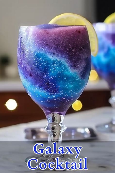 The Galaxy Cocktail is a visually stunning and refreshing drink that combines the bold flavors of tequila, grenadine, blue curacao, lemonade, and peach schnapps. This vibrant, colorful cocktail is perfect for any festive occasion, offering a sweet and tangy taste that is both appealing to the eye and the palate. Galaxy Cocktail, Bartender Drinks Recipes, Fun Drinks Alcohol, Bartender Drinks, Alcholic Drinks, Cocktail Drinks Alcoholic, Party Drinks Alcohol, Mixed Drinks Alcohol, Yummy Alcoholic Drinks