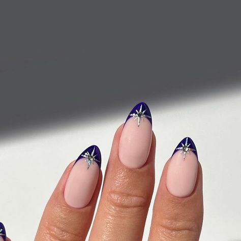 the nailologist🍒🌸🦋🌈✨ on Instagram: "Midnight blue tips centred with shimmering stars 💙✨💍  #nails #nailinspo #nailart #naildesign #winternails #autumnnails #fallnails" Midnights Nails Inspired, Dark Blue New Years Nails, Navy New Years Nails, Midnight Blue Almond Nails, Navy Tip Nails, Blue Nails With Star Design, Night Nails Design, Midnight Nails Design, Christmas Nails Navy Blue