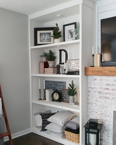 To complete the Faux Fireplace I added some built-in-bookshelves on both sides. I put the whole tutorial on the blog for you. Link in bio!… Diy Built In Bookshelves Around Fireplace, Fireplace Bookshelves Built In Decor, Tall Bookcase Next To Fireplace, Side By Side Bookshelves, Diy Bookshelf Fireplace, Fireplace Bookshelves Diy, Bookshelves In Living Room With Tv And Fireplace, Built In Shelf Decor Living Room Entertainment Center, Fireplace Built Ins Decor