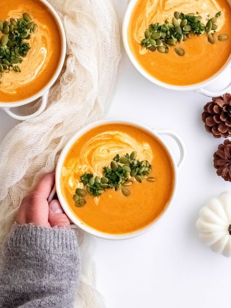 If you’re in the market for a fast, vibrant, naturally vegetarian dinner, you can’t beat this Thai-inspired Pumpkin Curry Soup with coconut milk. Made with just 10 shelf-stable pantry staples and exactly zero chopping, this curried pumpkin soup is a lifesaver for busy weeknights. Pumpkin Soup Coconut Milk, Mabon Recipes, Thai Pumpkin Curry, Pumpkin Coconut Soup, Pumpkin Curry Soup, Curried Pumpkin, Thai Pumpkin Soup, Curry Soup Recipes, Soup With Coconut Milk