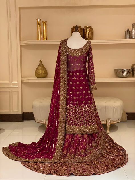 Includes: Shirt Sharara Dupatta Fabric: Silk net Color: Red Work Technique: Mastered Tailoring Description: It is a stitched three-piece outfit. Disclaimer: The color of the outfit may vary due to photographic lighting sources. Indian Reception Dress, Wedding Gharara, Custom Bridal Dress, Maroon Lehenga, Bridal Things, Pakistani Culture, Pakistani Bridal Dress, Walima Dress, Red Bridal Dress