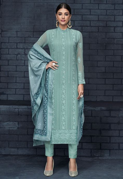 Semi-stitched Faux Georgette Pakistani Suit in Pastel Blue This Band Collar Neck and Full Sleeve attire with Poly Shantoon Lining is Prettified with Abstract Print, Resham and Patch Border Work Available with a Pastel Blue Poly Shantoon Pant and a Pastel Blue Art Muslin Silk Dupatta The Kameez and Bottom Lengths are 43 and 38 inches respectively Do note: The Length may vary upto 2 inches. Accessories shown in the image are for presentation purposes only.(Slight variation in actual color vs. ima Orang India, Celana Fashion, Indian Salwar, Kameez Designs, Gaun Fashion, Salwar Designs, Long Kurti Designs, Salwar Kamiz, Kurti Designs Party Wear