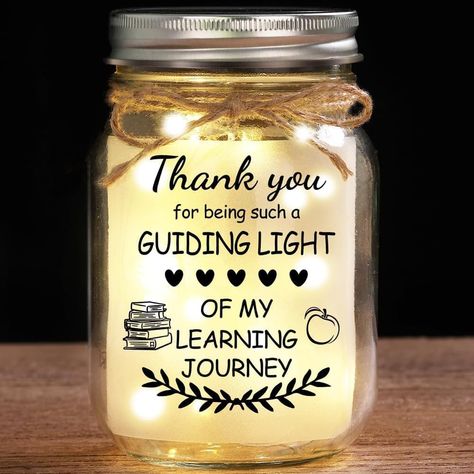 PRICES MAY VARY. Unique Gift for Teacher: Illuminate Teacher's special occasions with our 16oz Lighted Mason Jar. This beautiful and decorative gift is perfect gift to express your love to your teacher as a warm gifts for birthday, Christmas, Teacher's day, Valentine's day, Easter, Thanksgiving Day, anniversary or just a daily surprise gift Teacher Appreciation Gifts: Express your love with the warm message on this teacher gift: THANK YOU FOR BEING SUCH A GUIDING LIGHT OF MY LEARNING JOURNEY, i’ Cute Thank You Gifts For Teachers, Lighted Mason Jars Christmas, Mason Jar Teacher Gifts Christmas, Teacher Gift From Student Teacher, Homemade Appreciation Gifts, Gifts For Mentor Teacher From Student Teacher, Cute Gift Ideas For Teachers, Thanksgiving Teacher Gifts Ideas, Circuit Teacher Gifts