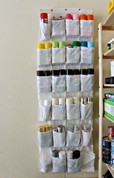 Say you invested in a rainbow of colors for a project, but have no where to keep them. Use hanging storage to make better use of empty wall space in your garage.Get more hanging shoe organizer ideas at HouseBeautiful.com. Shed Organisation, Garage Organization Tips, Paint Organization, Shed Organization, Organisation Hacks, Paint Storage, Apartment Organization, Diy Garage Storage, Garage Makeover