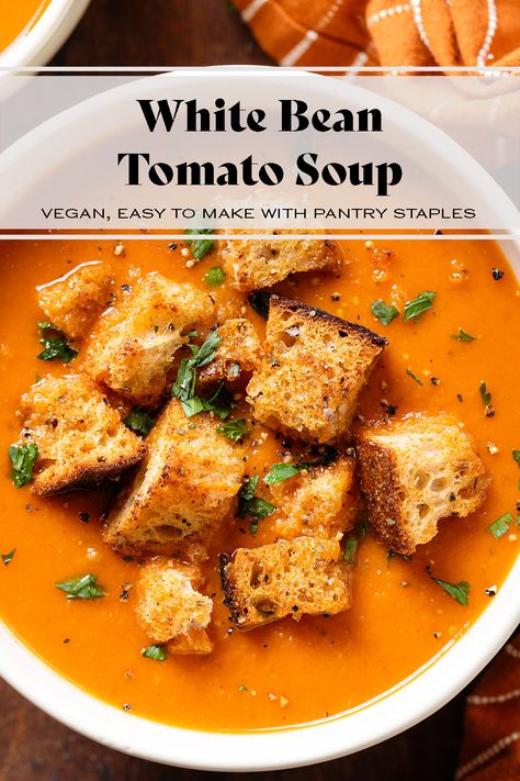 This White Bean Tomato Soup is vegan, gluten-free, and made with all pantry staples. The soup is thickened with white beans so there's no need for cream. The beans add a ton of protein and make the soup more filling. Serve it on its own with a drizzle of vegan yogurt or sour cream, or with grilled cheese or toasted bread. White Bean Soup With Tomatoes, Soup Recipes White Bean, Roasted Tomato And White Bean Soup, Blended White Bean Soup, Tomato Soup With Beans, Tomato Soup With White Beans, White Bean Tomato Soup, White Bean Soups, Food Pescatarian