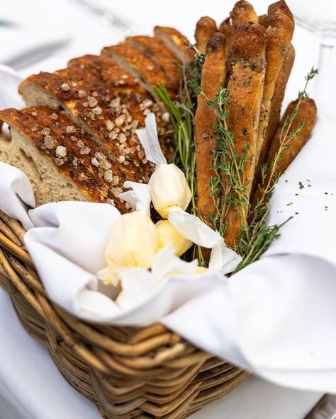 Bellagio Restaurant on Instagram: "Indulge in the authentic taste of Bellagio with our famous bread baskets filled with salted bread and sticks, a symbol of our commitment to exquisite taste and warm hospitality.🍴 Our chefs have journeyed to Cape Town to ensure you relish the authentic flavours that we are renowned for, where everything we serve is made in-house- a testament to our unwavering dedication to exquisite taste and genuine hospitality.💙 Welcome to a world where every bite is a celebration of flavour and every moment is a taste of Bellagio magic.✨ Reserve your Cape Town Bellagio experience: 021 879 1999 #Bellagio #CPTFoodie #HomeMadeBread #UnparalleledService #CapeTownDining" Restaurant Bread Basket, Bread Basket Restaurant, Wedding Bread Basket, Bread Basket Aesthetic, Bread Basket Ideas For Table, Bread Basket Ideas, Xmas Bread, Bread Centerpiece, Bread Service