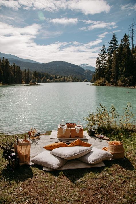 A picnic set up complete with pillows, blankets, and a charcuterie board by the lake in Whistler, BC Proposal In The Woods, Proposal Picnic Set Up, Proposal Set Up, Casual Wedding Dinner, Proposal Set Up Ideas Outside, Engagement Set Up Ideas, Proposal Intimate, Picnic Proposal Ideas, Picnic Set Up