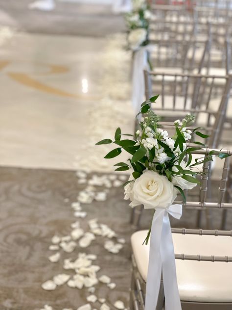 White and green wedding aisle chair flowers Diy Chair Flowers Wedding, Bench Isle Decorations Wedding, Isle Chair Decor Wedding, White Aisle Flowers Wedding, Wedding Aisle White Flowers, Flowers For Aisle Wedding, Ceremony Chair Flowers, Outdoor Aisle Decor, Simple Aisle Decorations Wedding