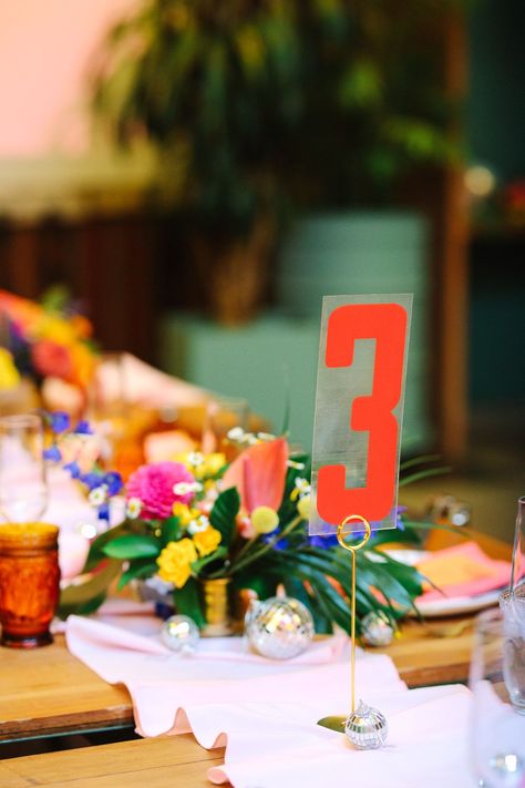 Colorful wedding reception with streamers balloons and bright flowers | Colorful Downtown Los Angeles Valentine Wedding | Los Angeles wedding photographer | #losangeleswedding #colorfulwedding #DTLA #valentinedtla   Source: Mary Costa Photography | Los Angeles Colorful Wedding Reception, Vintage Marquee Sign, Wedding Reception Table Decorations, Maroon Wedding, Photography Los Angeles, Eclectic Wedding, Flowers Colorful, Creative Stationery, Los Angeles Wedding Photographer