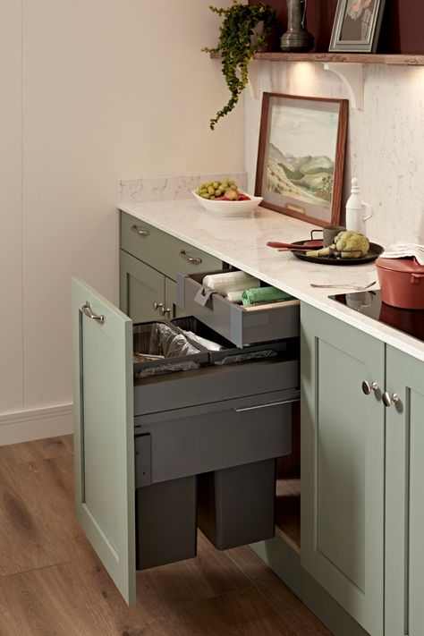 Looking to keep your green kitchen ideas clean and tidy? Look no further than this kitchen cleaning hack. Howdens Kitchen Bins allow recycling and waste products to be easily separated in a single unit. Available in several different sizes, this kitchen storage inspiration can be tailored to suit your available kitchen design. Simply add a shaker kitchen cabinet door to complete the look. Kitchen Units In Bathroom, Kitchen Cupboard Internals, Kitchen Bin Cupboard, Slimline Kitchen Cabinets, Bin Cupboard Kitchen, Recycling Kitchen Storage, Built In Bin Kitchen, Howdens Kitchen Island Ideas, Bin Storage Ideas Kitchen