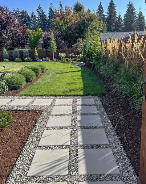 Backyard Easement Landscaping Ideas, Deck Perimeter Landscaping, Backyard Paver Walkway, Backyard Perimeter Ideas, How To Landscape A Dirt Yard, Curved Walkway With Square Pavers, Pavers And Pea Gravel Walkways, Concrete Patio Transition To Yard, Pavement Backyard Ideas