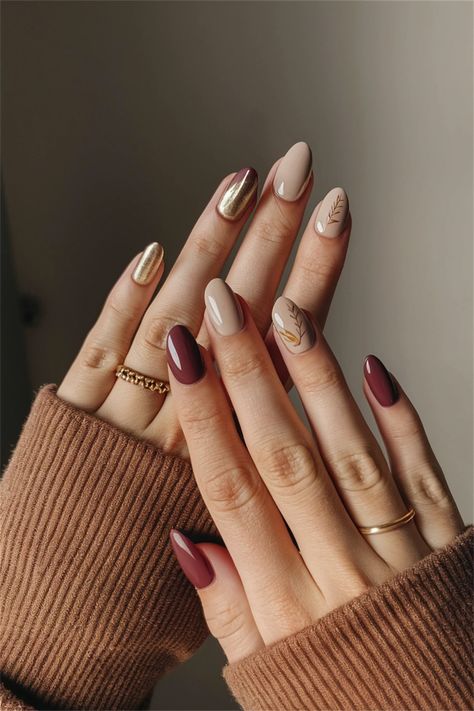 Embrace the essence of fall with these cozy, simple nail ideas that encapsulate the beauty of autumn. Picture deep burgundy nails adorned with delicate gold accents, reflecting the changing leaves and warm evenings. This style is not only chic but also effortless, perfect for any fall gathering. Discover how such simple nail ideas can elevate your seasonal look while keeping things classy and understated! Simple Acrylic Nails Autumn, Almond Short Nails Fall, Pretty Almond Nails Fall, Monochromatic Fall Nails, Natural Nails Fall Design, Autumn Nail Designs Simple, Almost Fall Nails, Nail Art Fall Autumn, Nail Ideas Shellac