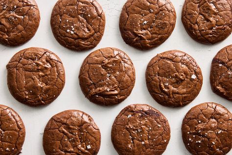 NYT Cooking: The perfect union of two of America’s most popular desserts, brownies and cookies, this recipe offers all the goodness of a brownie and bakes up in a fraction of the time. A blend of chopped chocolate, unsweetened cocoa and espresso powder lends enormous depth to the base of these cookies. The only time-intensive step in this recipe is beating the eggs and sugar, but don’t skimp on that process, a Most Popular Desserts, Cookie Brownie Recipe, Gluten Free Sourdough, Chewy Brownies, Oreo Brownies, Popular Desserts, Sourdough Discard, Brownie Cookies, Unsweetened Cocoa