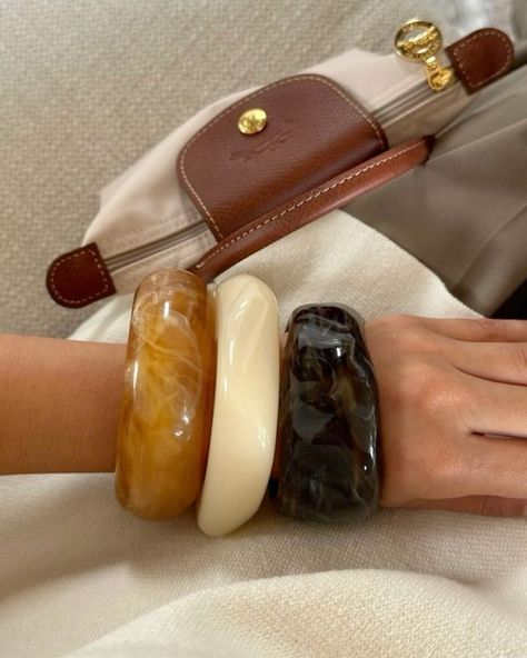 Our Maje bracelets are made of resin and acrylic Bangle Bracelets Outfit, Chunky Jewelry Aesthetic, Jewelry Maximalist, Leo Energy, Maximalist Jewelry, Bracelets Outfit, Accessories Board, Bracelet Aesthetic, Big Bracelets