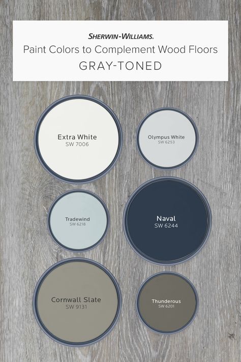 If your wood floors are gray-toned, this palette from Sherwin-Williams can help you pick a wall color to complement them perfectly. Tap this pin to learn why hues like Extra White SW 7005, Naval SW 6244, Cornwall Slate SW 9131, and others can help bring classic charm, bold drama, and more. #sherwinwilliams #woodfloors #graywoodfloors #paint #painting #diy #interiordesign #decor Gray Wood Floors Color Scheme, Navy Walls Light Wood Floors, Barndo Kitchen Ideas Modern, Paint That Matches Dark Wood, Navy Paint Palette Colour Schemes, Blue Grey Carpet Bedroom, Dark Gray And White House Exterior, How To Style Gray Floors, Colors That Complement Gray