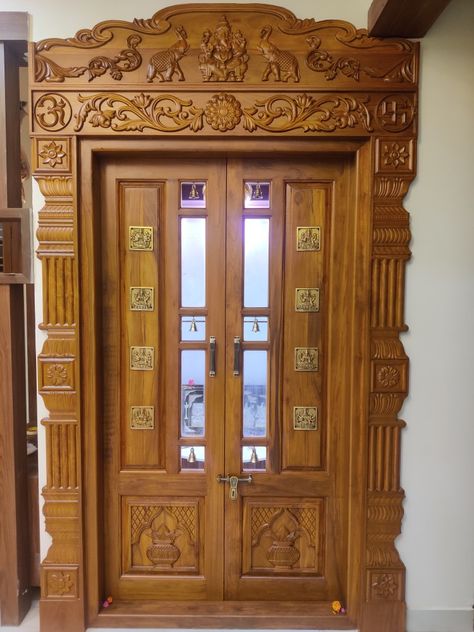 South Indian Pooja room door South Indian Pooja Room, Puja Room Door Design Indian Modern, South Indian Pooja Room Design, Pooja Door Design Modern, Pooja Room Door Design Modern, Pooja Room Double Door Designs, Indian Pooja Room, Pooja Room Ideas Indian, Mandir Door