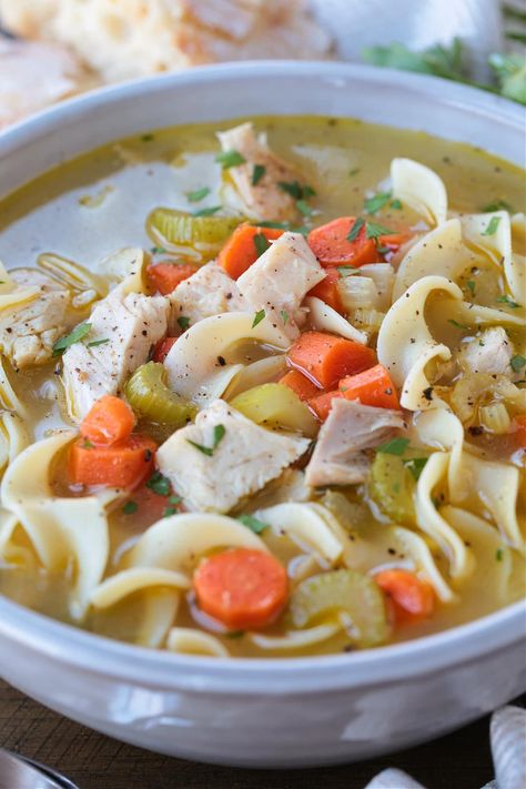 The best Homemade Turkey Soup is made with leftover turkey bones! Cozy and comforting, it's the best bowl of turkey soup you'll ever taste! Beefy Tomato Soup Recipe, Best Turkey Soup, Turkey Soup From Carcass, Homemade Turkey Soup, Leftover Turkey Soup, Turkey Noodle Soup, Turkey Soup Recipe, Turkey Broth, Turkey Soup