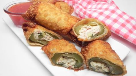 These fried dill pickles stuffed with crab salad and encased in egg roll wrappers make for fun finger food and easy party conversation. Stuffed Dill Pickles, Pickle Egg Rolls, Stuffed Pickles, Can Crab Meat Recipes, Fried Dill Pickles, Canned Crab Meat, Egg Rolls Recipe, Crab Meat Recipes, Crab Stuffed