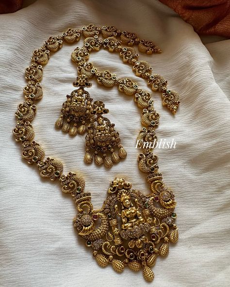 Lakshmi with Double Peacock Long Neckpiece For Rs 2450 Product I’d 3365 Shop from our website emblish.in #emblish #emblishcoimbatore #antiquejewellery #haram #southindianjewels #nakshineckpiece #telugubrides #hyderabadbride . . . (Haram ,temple jewellery, lakshmi haram ,bridal haram ) Lakshmi Haram Designs Gold Latest, Gold Temple Jewellery Necklace Set, Long Necklace Designs, Long Neckpiece, Temple Jewellery Set, Lakshmi Haram, Antique Wedding Jewelry, Heavy Jewellery, Brother Wedding