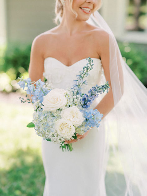 Blue and white wedding flowers bridal bouquet Spring Wedding Florals Blue, Light Blue Bride Bouquet, Wedding Flowers With Blue Dresses, Timeless Bride Bouquet, Dusty Blue Flowers Bouquet Bridesmaid, Light Blue Flower Bouquet Wedding, Different Bridal Bouquet Styles, Blue Florals For Wedding, Spring Wedding Flower Centerpieces