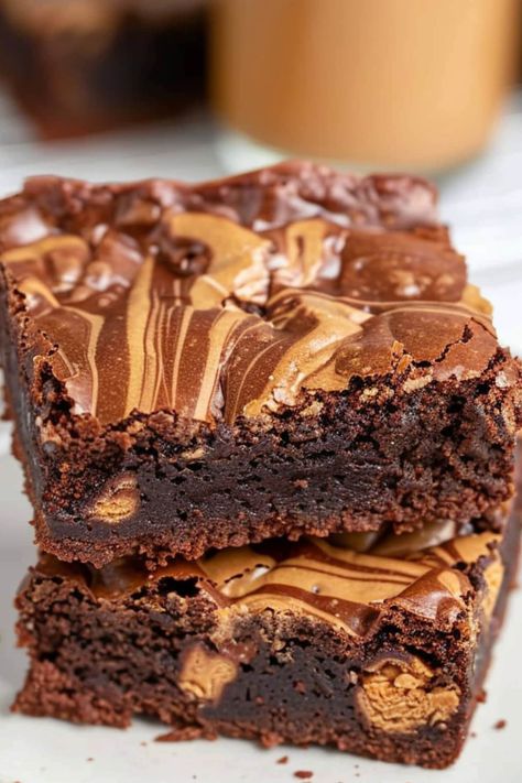 Rich and dreamy peanut butter brownies - need I say more? They're impossibly indulgent and deliciously luxurious. One bite will satisfy all your cravings. Brownies With Peanut Butter Chips, Best Peanut Butter Brownies, Brownie Recipes Peanut Butter, Peanut Butter Swirl Brownies Box Recipes, Chocolate Peanut Butter Brownies Easy, Peanut Butter Brownie Bars, Chocolate And Peanut Butter Brownies, Peanut Butter Brownies Recipe Homemade, Peanut Butter Chocolate Chip Brownies