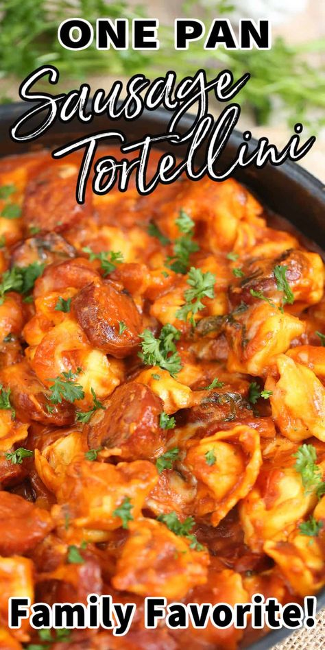 This One Pan Cheesy SAUSAGE & TORTELLINI SKILLET is a quick and delicious meal that uses just six ingredients. The whole family will love this easy Italian dish, which is so perfect for those busy weeknights. #pasta #tortellini #sausage #easydinner #skilletrecipe #onepan #dinner #recipe Italian Sausage With Tortellini Recipe, One Pot Tortellini And Sausage, Tortellini And Kielbasa Recipes, Tortellini Sausage Recipes, Cheesy Sausage Tortellini, Sausage Tortellini Skillet, Kilbasa Sausage Recipes, Smoked Sausage Casserole, Pasta Tortellini