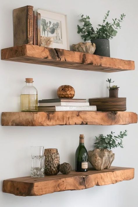 Maximize your wall space with stylish DIY floating shelves! 🛠️✨ A chic and functional addition to any room. #FloatingShelves #DIYHomeDecor #StorageSolutions Exposed Wood Shelves, Wood Beam Shelves, Floating Beam Shelves, Homemade Floating Shelves, Wood Shelves Diy, Thick Wooden Shelves, Raw Wood Shelves, Cedar Shelves, Natural Wood Shelves