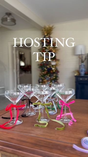 Elizabeth Edelen on Instagram: "Comment “BOW” to grab this stunning velvet multicolored ribbon set to easily identify glasses during a party! Such an easy hosting tip for the holiday season 🎀 Hosting tip Christmas party tip Christmas hosting tip Party hosting tip Holiday hosting tip Velvet ribbon Wine charms Follow my shop @EverydayDecorPlusMore on the @shop.LTK app to shop this post and get my exclusive app-only content! #liketkit #LTKHoliday #LTKparties #LTKstyletip @shop.ltk https://liketk.it/4raMm" Ribbon On Glasses, Girly Holiday Party, Christmas 21st Birthday Party, Ribbon On Wine Glasses, Hosting A Holiday Party, Bow Christmas Party, Wine Glasses With Bows, Bows On Wine Glasses, Wine Glass With Bow