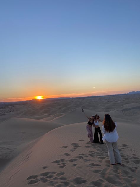 three girls taking pictures at the imperial sand dunes in california during sunrise Sand Dunes California, Imperial Sand Dunes California, Sand Dunes Pictures, Sand Dune Pictures, Glamis Sand Dunes Photoshoot, California Desert Aesthetic, Sand Dunes Aesthetic, Little Sahara Sand Dunes Utah, Sand Dunes Outfit