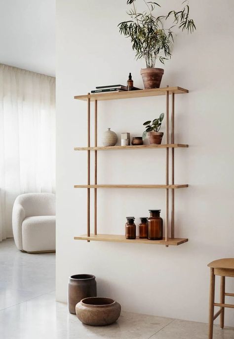 Fogia's minimalist and very versatile 'Bond' oak shelving unit, shown in a minimalist living room in white and neutral earth tones | 21 of the best wall-mounted shelving units | These Four Walls blog Fogia Bond, Diy Shelves Design, Minimalist Shelves Decor, Oak Shelving Unit, Wall Mounted Shelving Unit, Wood Shelving Units, Minimalist Shelves, Wall Display Shelves, Shelving Design