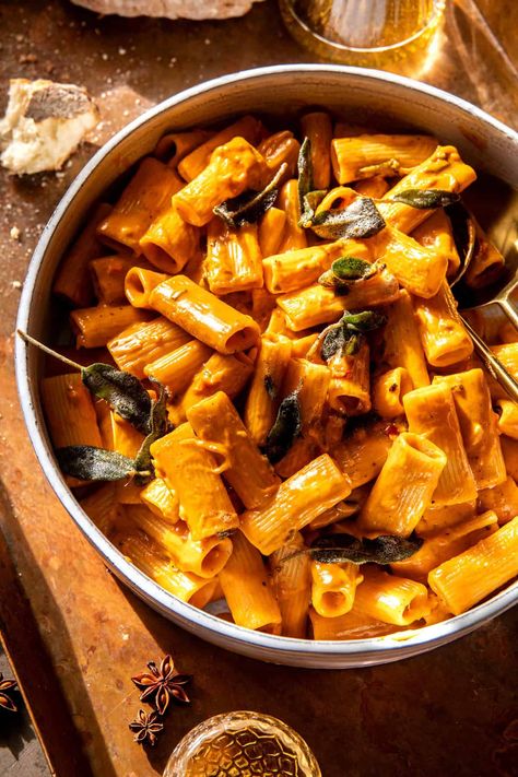 Pumpkin Pasta Alla Vodka. Half Baked Harvest Pizza, Winter Pasta Dishes, Pasta Alla Vodka, Winter Pasta, Half Baked Harvest Recipes, Pesto Cheese, Friendsgiving Food, Vodka Pasta, Pumpkin Sauce