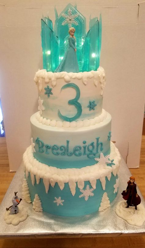 All edible, sugar glass ice castle cake!! frozen cake, elsa ice castle, disney frozen cake, buttercream icicles, olaf, 3 tier cake. I made the mold for the sugar glass. #frozen2cake, #elsacake, #icecastlecake, #sugarglass, #homemademold, #pulledsugar Frozen Tiered Birthday Cake, Elsa Ice Castle Cake, Frozen Cake Buttercream, Castle Cake Diy, Elsa Castle Cake, Elsa Ice Castle, Frozen Torte, Ice Castle Cake, Frozen Castle Cake