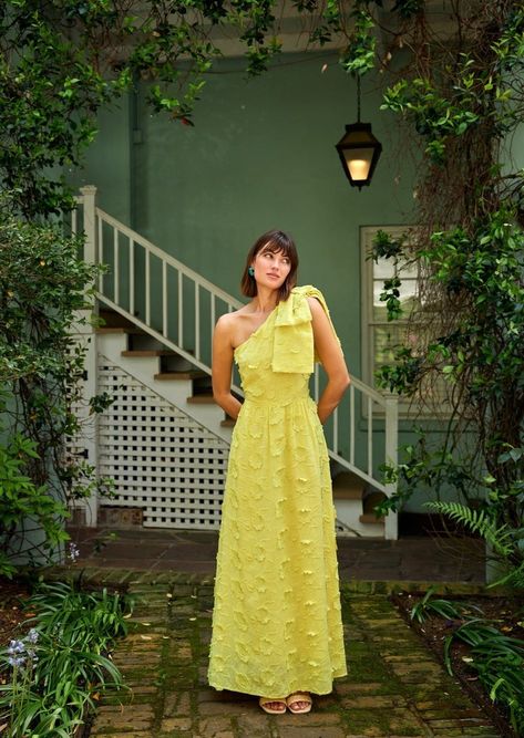 Feel like a little ray of sunshine every time you put on the hot yellow Caroline Gown. Crafted of lightweight 3-D floral cotton, this dress features a dramatic shoulder bow, structural side boning, and one-shoulder styling. Wear this for an evening soirée or on your next tropical vacation! Classic fit - We recommend or Bridesmaid Dresses Italy Wedding, Garden Bridesmaid Dress, Yellow One Shoulder Dress, Flower Wedding Guest Dress, Garden Party Formal Dress, Nontraditional Bridesmaid Dresses, One Side Off Shoulder Dress, Garden Formal Attire, Funky Formal Wedding