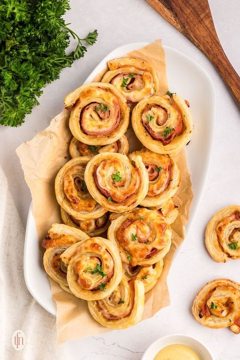 Brunch Roll Ups, Ham And Cheese Puff Pastry Pinwheels Paula Dean, Ham Cheese Pinwheels Puff Pastry, Ham And Cheese Puffed Pastry Pinwheels, Han And Cheese Puff Pastry Pinwheels, Puff Pastry Recipes Pinwheels, Ham And Cheese Puff Pastry Wheels, Ham And Cheese Swirled Pastries, Puffed Pastry Pinwheels