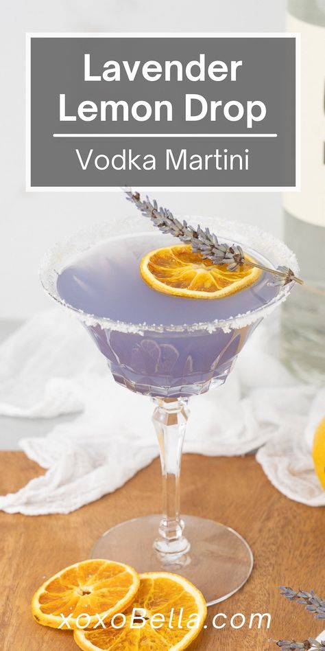 A lavender lemon drop vodka martini is a light, refreshing and totally delicious spring cocktail. Blending the unmistakeable flavour of lavender with a bright splash of lemon and sweet orange, this lavender lemonade vodka cocktail is perfectly balanced. So if you’re looking for spring drink ideas, I recommend making this mixed drink with homemade lavender simple syrup, vodka and triple sec. Vodka and triple sec pair up with lemon to make this delicious lavender lemon drop vodka martini. #... Lemon Lavender Vodka Cocktail, Purple Lemon Drop Martini, Lavender Drop Martini, Lavender Drop Martini Yard House, Lavender Lemondrop Martini, Lavender Lemon Drop Martini Recipe, Lavender Espresso Martini, Purple And Yellow Cocktail, Martinis With Vodka