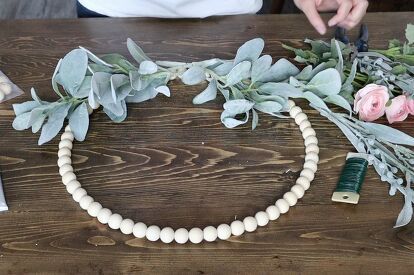 Bead Hoop Wreath, How To Make A Wood Bead Wreath, Wood Bead Wreath Diy, Wood Bead Wreaths, Wood Bead Wreath, Beaded Wreath, E6000 Glue, Wood Beads Diy, Easy Diy Wreaths